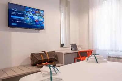 TV o dispositivi per l'intrattenimento presso Fortitudo Appartamento Duomo Cremona Self Check-in Centro Storico