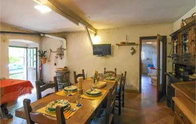 TV o dispositivi per l'intrattenimento presso Lovely Home In Codivara With Wifi