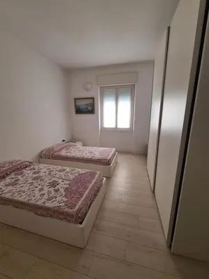 Letto o letti in una camera di La Casa del Centro by PortofinoVacanze