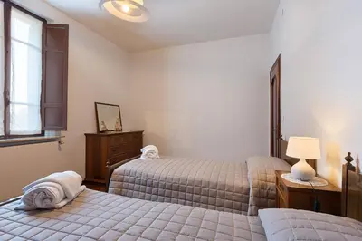 Letto o letti in una camera di Locanda Da Romano
