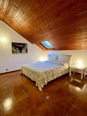 Letto o letti in una camera di CASTAGNETO 11