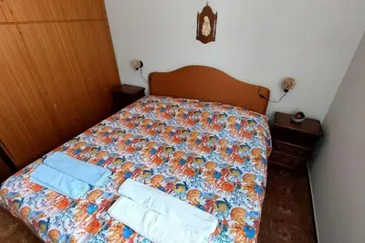 Letto o letti in una camera di Il Quadrifoglio Bilocale tra Lavagna e Chiavari