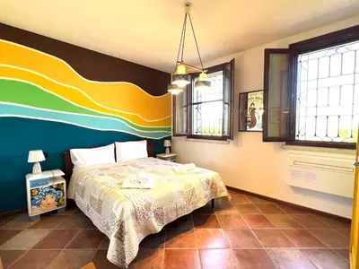 Letto o letti in una camera di Villa Rita - Rooms&Art