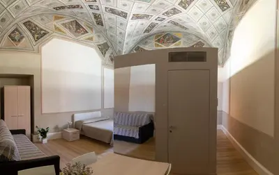 Letto o letti in una camera di Le Residenze di Mantova