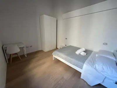 Letto o letti in una camera di Le Residenze di Mantova