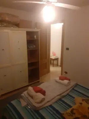 Letto o letti in una camera di Appartamento Vacanze Malù