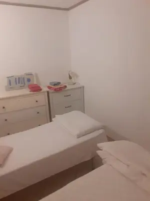 Letto o letti in una camera di Appartamento Vacanze Malù