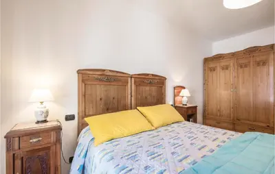 Letto o letti in una camera di Casa Patrizia