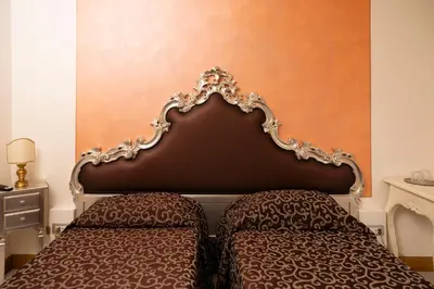 Letto o letti in una camera di La Corte San Lorenzo