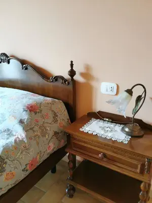 Letto o letti in una camera di Luci nel Bosco B&B