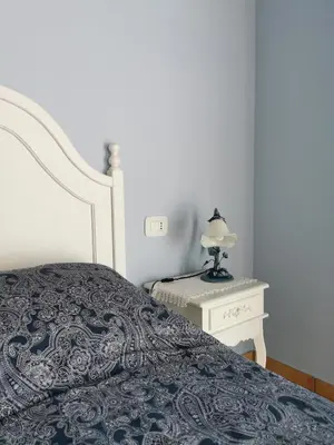 Letto o letti in una camera di Luci nel Bosco B&B