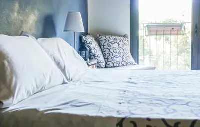 Letto o letti in una camera di Quattrocolli B&B