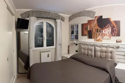 Letto o letti in una camera di Le Rose , Relax in Casolare del 1700