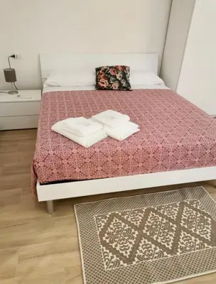 Letto o letti in una camera di Casa Sant'Anna