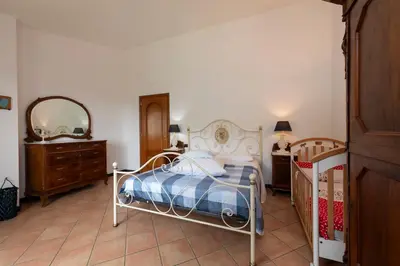 Letto o letti in una camera di 187 - Ca da Pincianna, con giardino a 15 minuti dal MARE