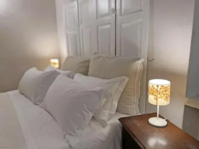 Letto o letti in una camera di Suite 9, Parma Centro