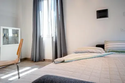 Letto o letti in una camera di La Casetta