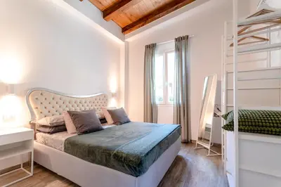 Letto o letti in una camera di La Casetta