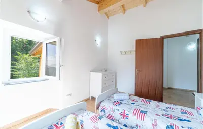 Letto o letti in una camera di 2 Bedroom Lovely Home In Tribogna