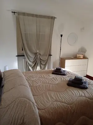 Letto o letti in una camera di Dolce Casa da Roby e Andrea by PortofinoVacanze
