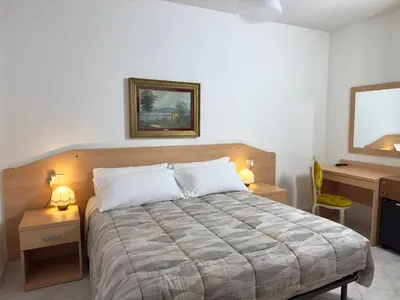 Letto o letti in una camera di Albergo Edera