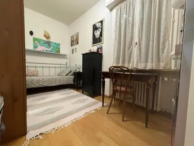 Letto o letti in una camera di Appartamento casa sul fiume