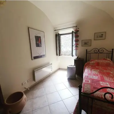 Letto o letti in una camera di Affittacamere Dodo - Borgo di Filetto