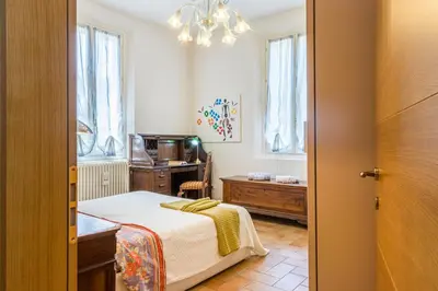 Letto o letti in una camera di Balsamico Suites - Near Ferrari Museum & Railway