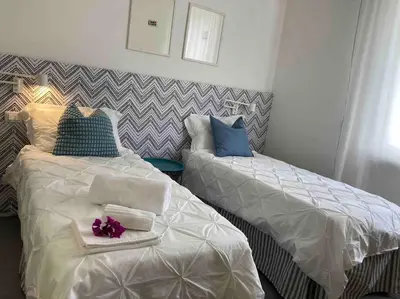 Letto o letti in una camera di Casa Graziella