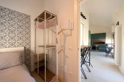 Letto o letti in una camera di Reggio Center Lovely Rooms
