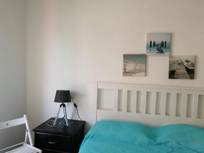 Letto o letti in una camera di CASA RAPALLO STAR