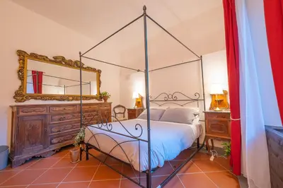 Letto o letti in una camera di Veleia Romana B&B