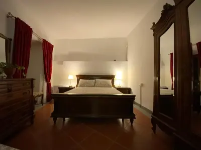 Letto o letti in una camera di Veleia Romana B&B