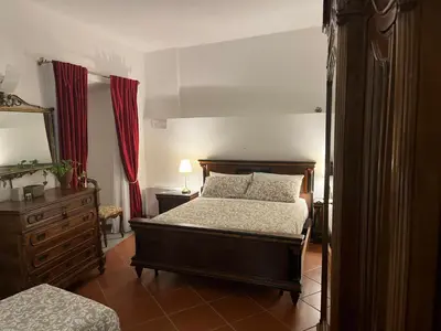 Letto o letti in una camera di Veleia Romana B&B