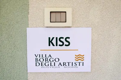 Certificato, attestato, insegna o altro documento esposto da Affittacamere Borgo degli Artisti boutique rooms