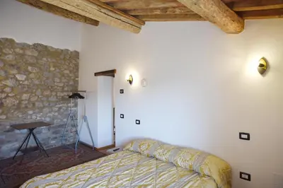 Letto o letti in una camera di Appartamento da Vinci - Appartamento Masaccio