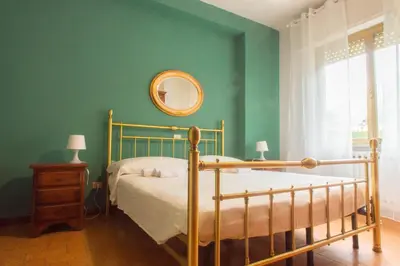 Letto o letti in una camera di Casa Vinicia