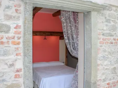 Letto o letti in una camera di Apartment in Casola near Torre di Casola