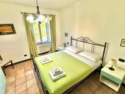 Letto o letti in una camera di La Spezia Vezzano 5 terre - Il Ciliegio