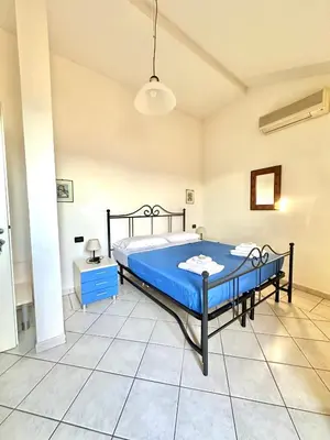 Letto o letti in una camera di La Spezia Vezzano 5 terre - Il Ciliegio