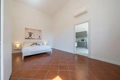 Letto o letti in una camera di FREE PARKING - Meraviglioso appartamento a Modena