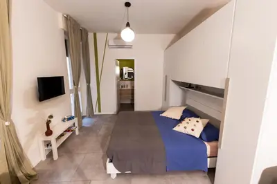 Letto o letti in una camera di Guesthouse Violetta DI Parma