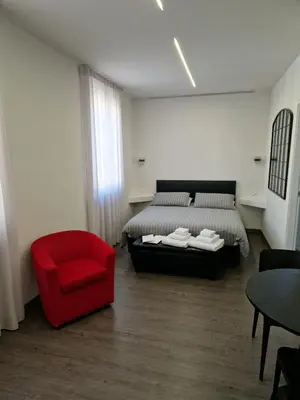 Letto o letti in una camera di Casa Antelami