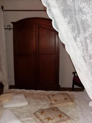 Letto o letti in una camera di B&B La Dimora delle Calendule