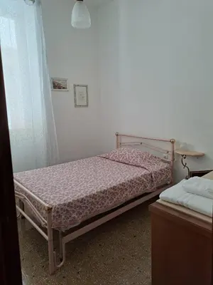 Letto o letti in una camera di DA GINA