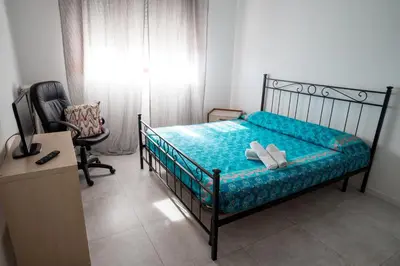 Letto o letti in una camera di Affittacamere Ortensia