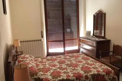 Letto o letti in una camera di Appartamento Incoronata