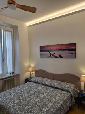 Letto o letti in una camera di SIMARE - 2 camere matrimoniali a 500metri da stazione e spiaggia