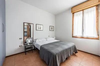 Letto o letti in una camera di Design dwelling near Policlinico