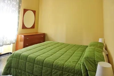 Letto o letti in una camera di Il Rospo apartment